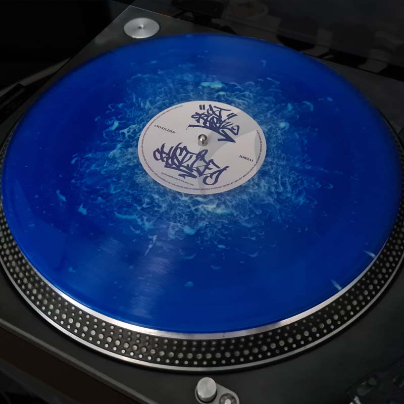 HJ002 Repress - DJ Crystl - Blue Smoke Vinyl On Turntable